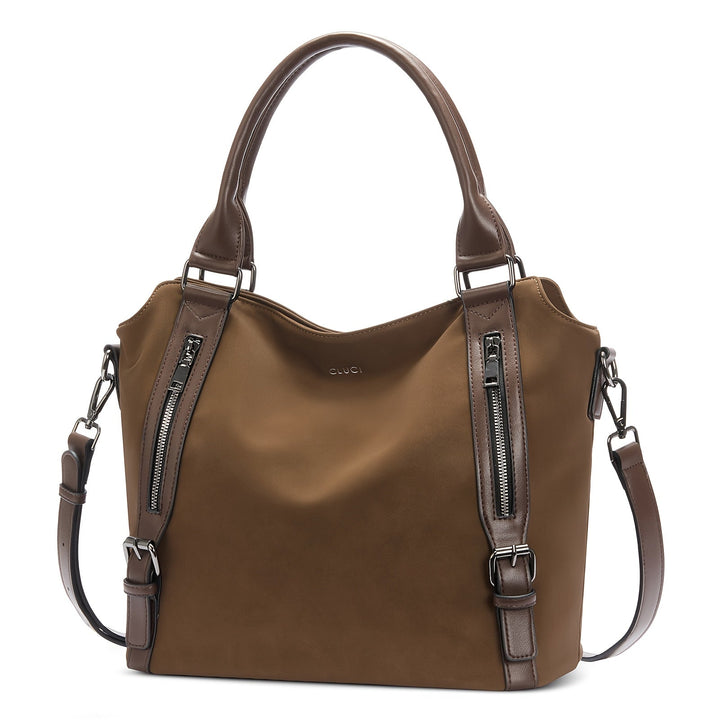 A woman wearing a roomy shoulder bag across her body while out running errands.