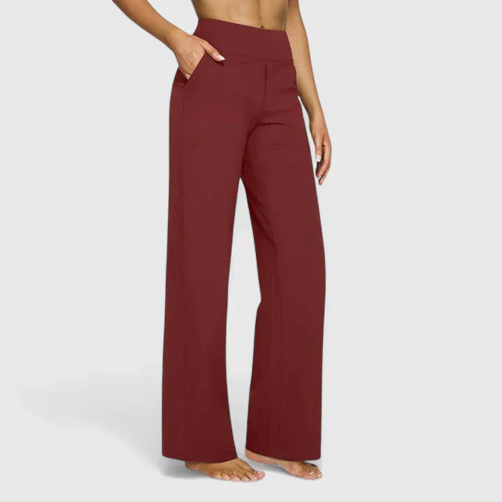 A woman in elegant straight-leg pants with pockets, styled for a polished everyday look.
