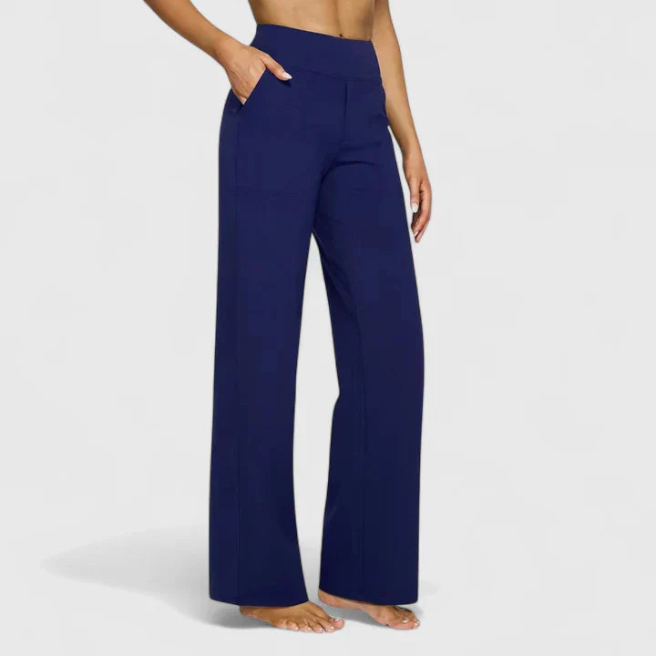 A woman in elegant straight-leg pants with pockets, styled for a polished everyday look.