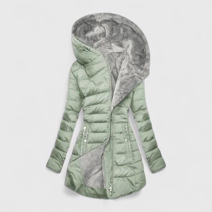 A sage green quilted winter coat with a deep, soft-lined hood and an angled zip front.
