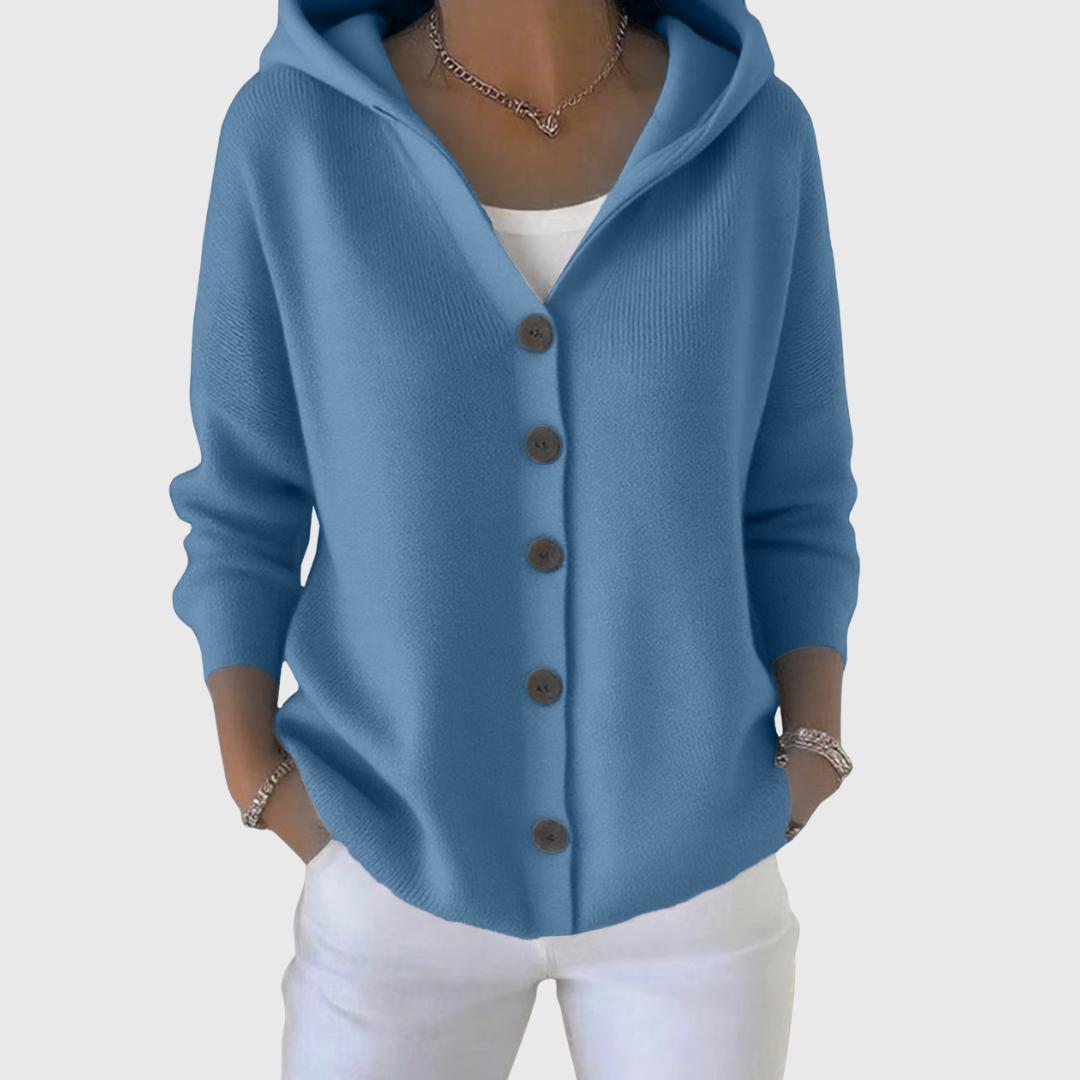 A woman wearing a hooded button cardigan open over a top for a relaxed everyday look.