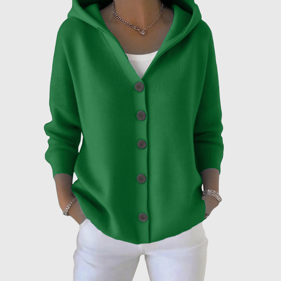A woman wearing a hooded button cardigan open over a top for a relaxed everyday look.