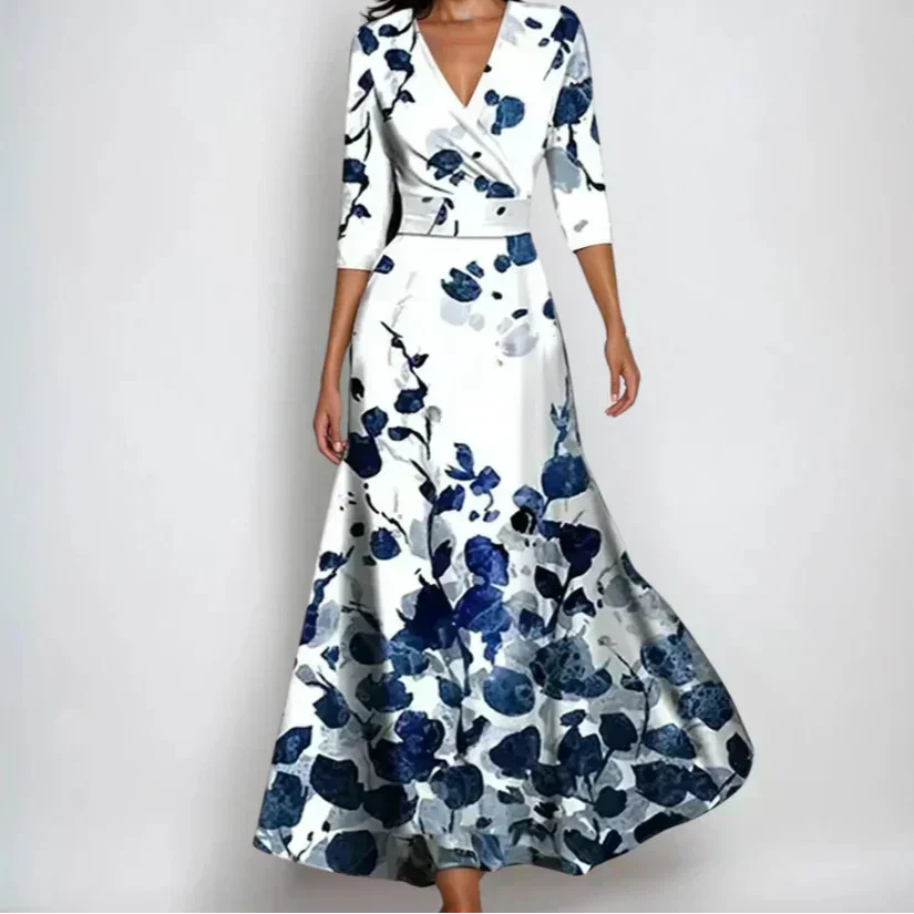 Woman wearing the Donna floral midi dress with wrap neckline and flowing skirt at a celebration.