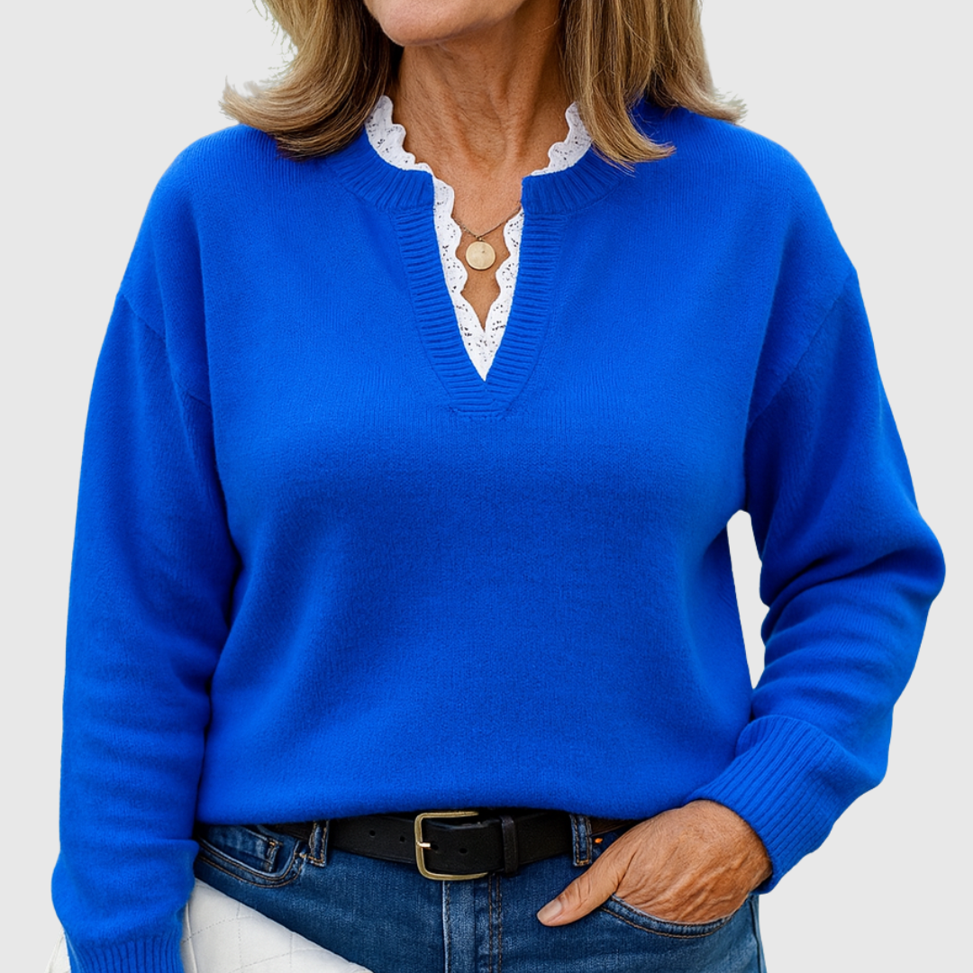 A woman wearing an elegant top with delicate detailing, flattering and comfortable for day to evening.