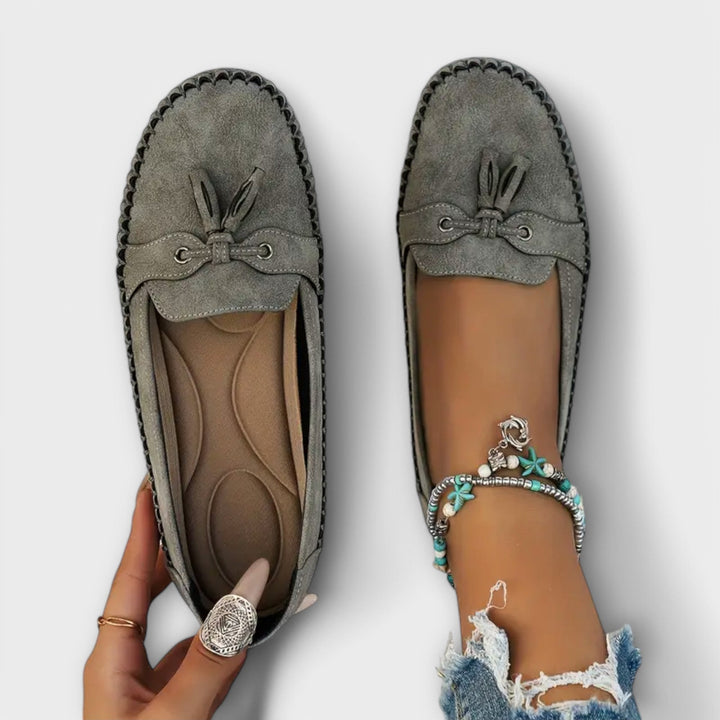 A woman wearing classic loafers on an easy day in town.