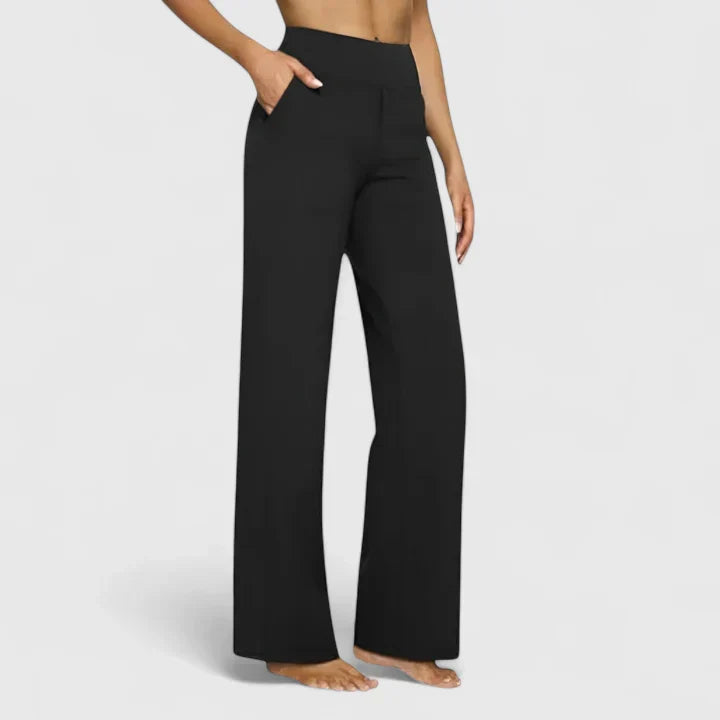 A woman in elegant straight-leg pants with pockets, styled for a polished everyday look.