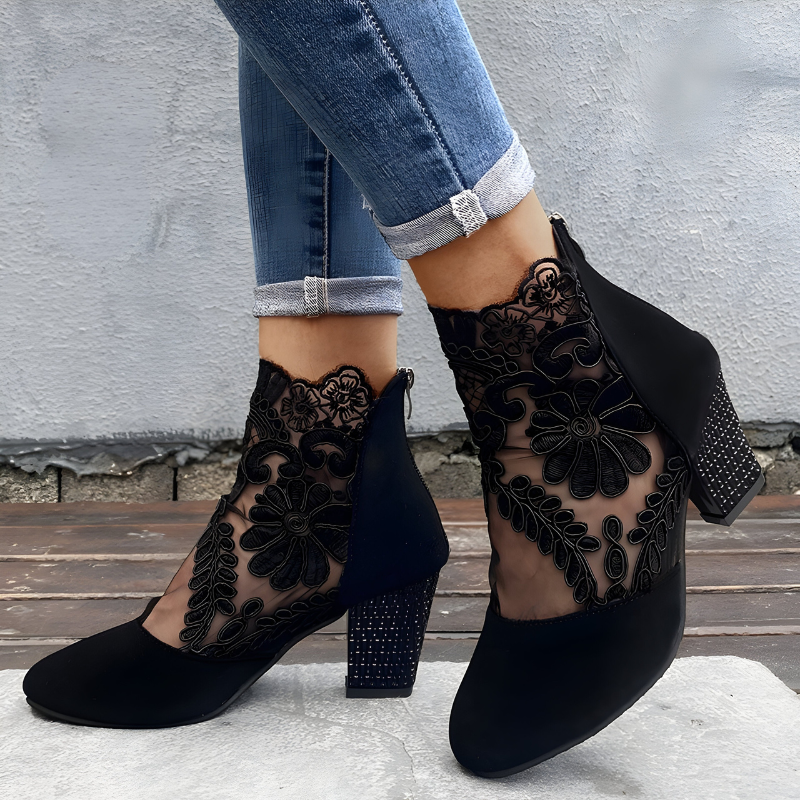 A woman in wide-fit comfort heels standing comfortably through a busy day out.