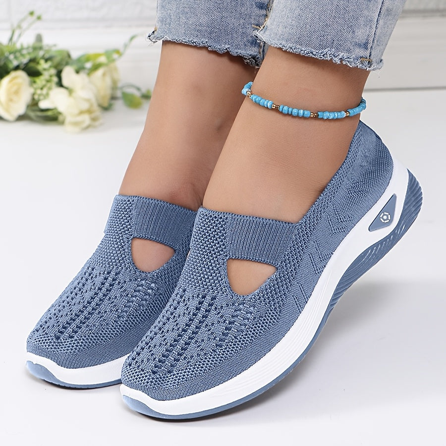 A woman stepping into easy slip-on comfort sneakers with no laces.