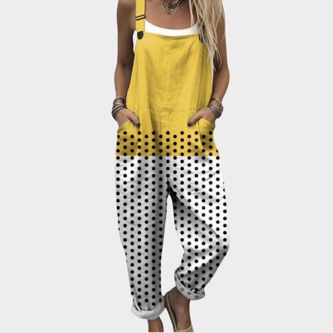 Woman wearing overalls in a fresh yellow-to-white gradient scattered with playful spots