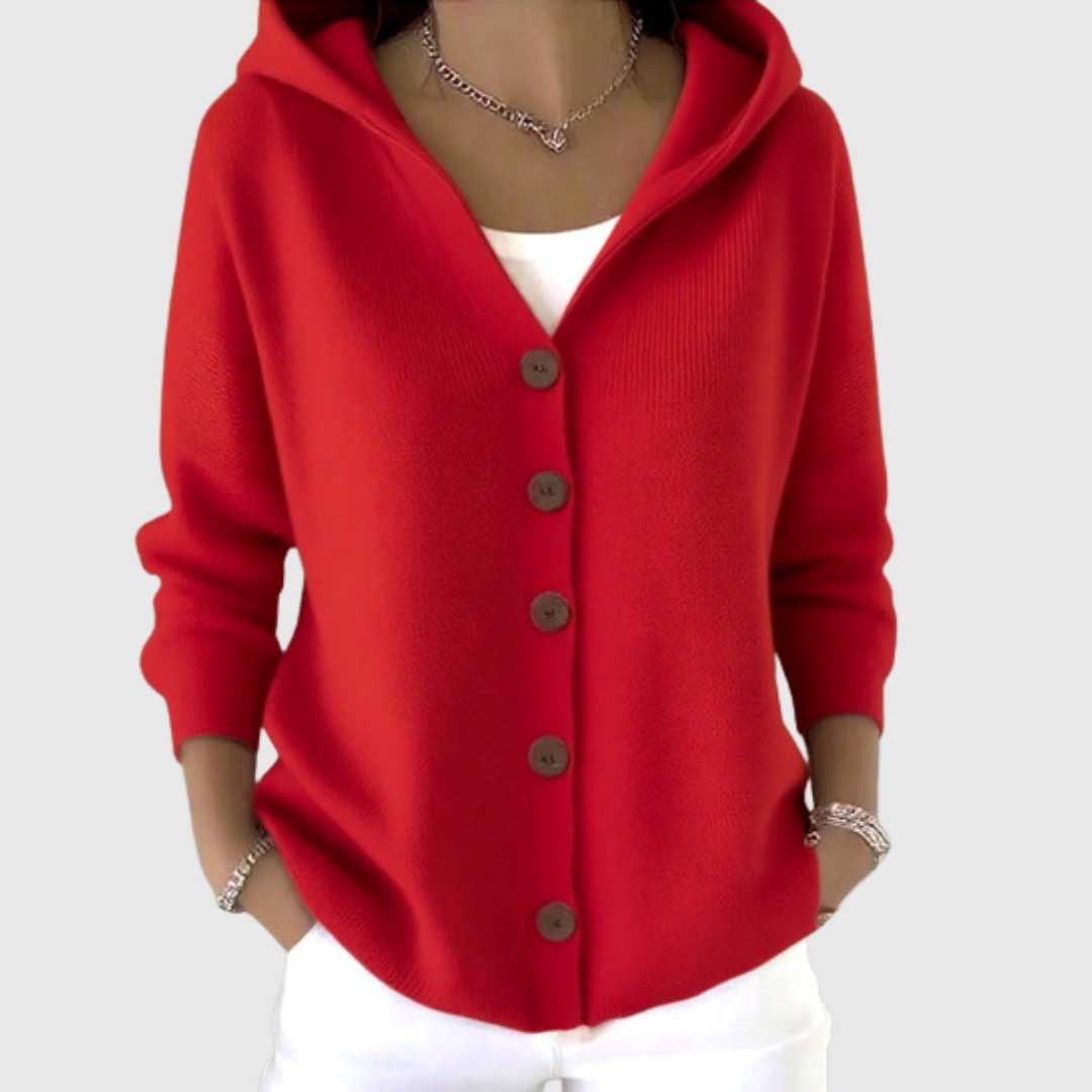 A woman wearing a classic hooded cardigan, relaxed and comfortable outdoors on a mild day