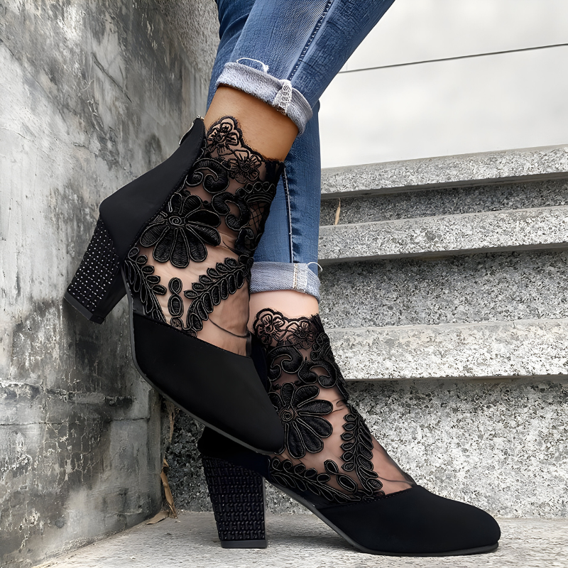 A woman in wide-fit comfort heels standing comfortably through a busy day out.