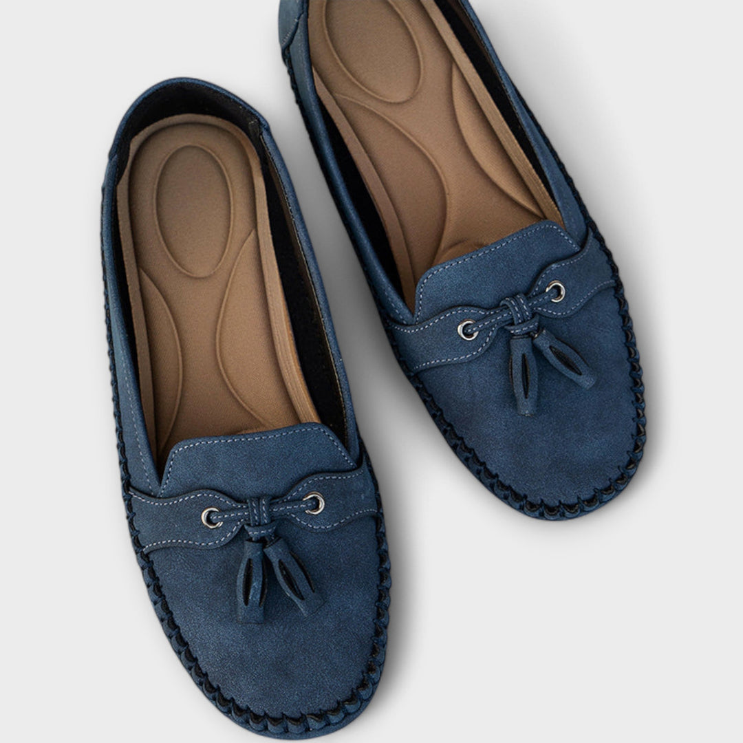 A woman wearing classic loafers on an easy day in town.