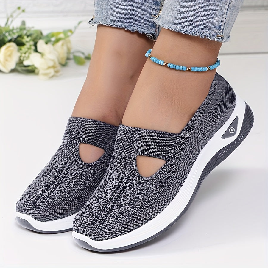 A woman stepping into easy slip-on comfort sneakers with no laces.