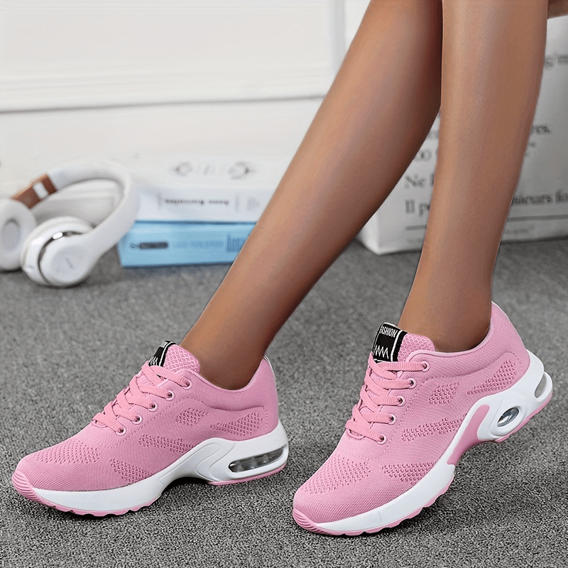 A woman walking further in breathable, air-cushioned non-slip sneakers.
