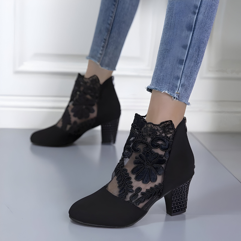 A woman in wide-fit comfort heels standing comfortably through a busy day out.