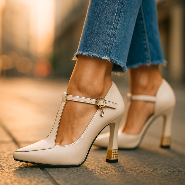 A woman in embellished T-strap block heels with sparkling detail at an evening celebration.
