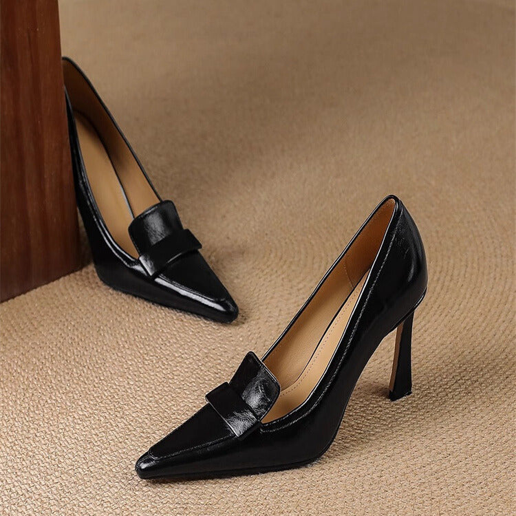 A woman in pointed refined heels stepping out confidently to a festive gathering.