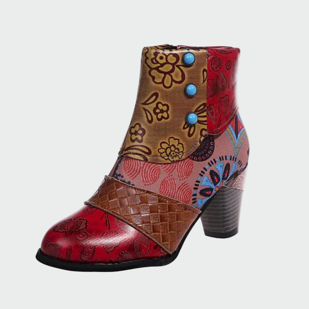 Woman wearing colourful boho-chic patterned boots with jeans on a bright day.