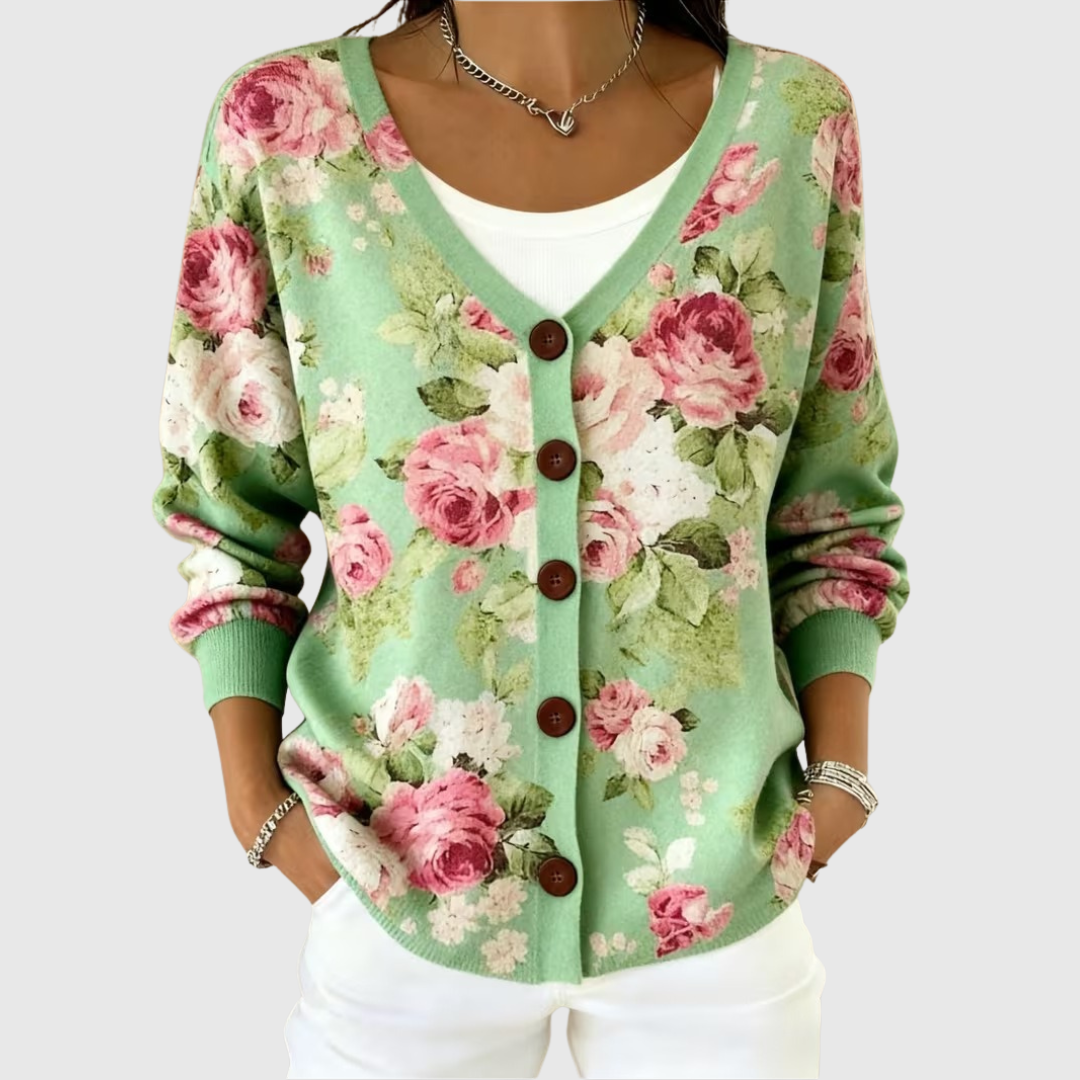 A woman wearing a soft button cardigan open over a top, neat and comfortable