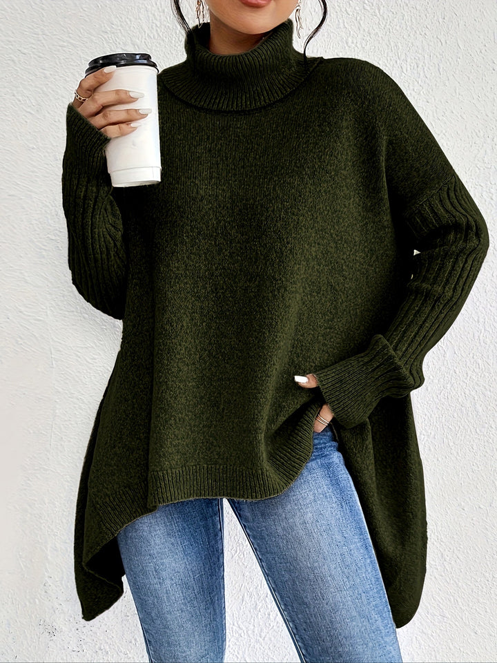 A woman wearing a stand-collar sweater with a chic asymmetric drape, warm and polished.