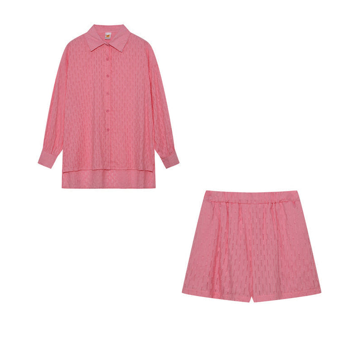 A woman wearing a classic button shirt with matching relaxed shorts, polished and easy.