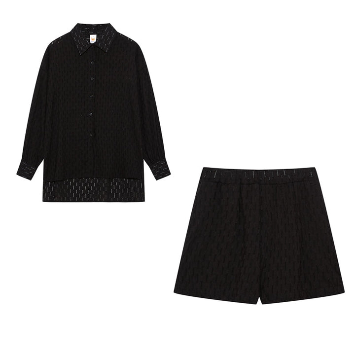 A woman wearing a classic button shirt with matching relaxed shorts, polished and easy.