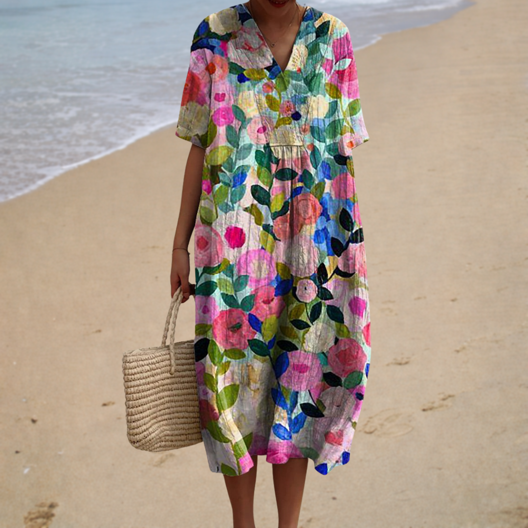 A woman in a relaxed, softly patterned summer dress going about a sunny day in comfort.