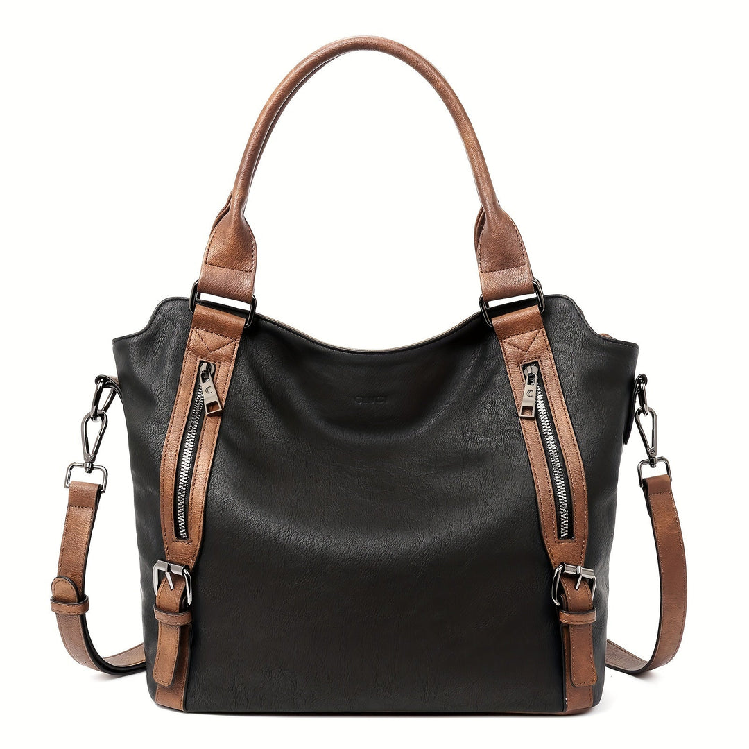 A woman wearing a roomy shoulder bag across her body while out running errands.