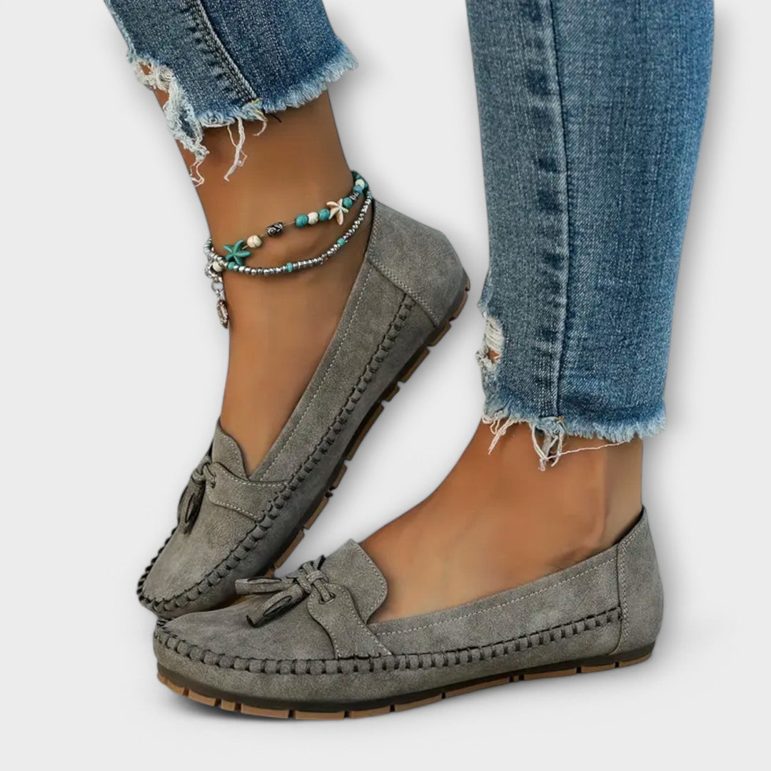 A woman wearing classic loafers on an easy day in town.