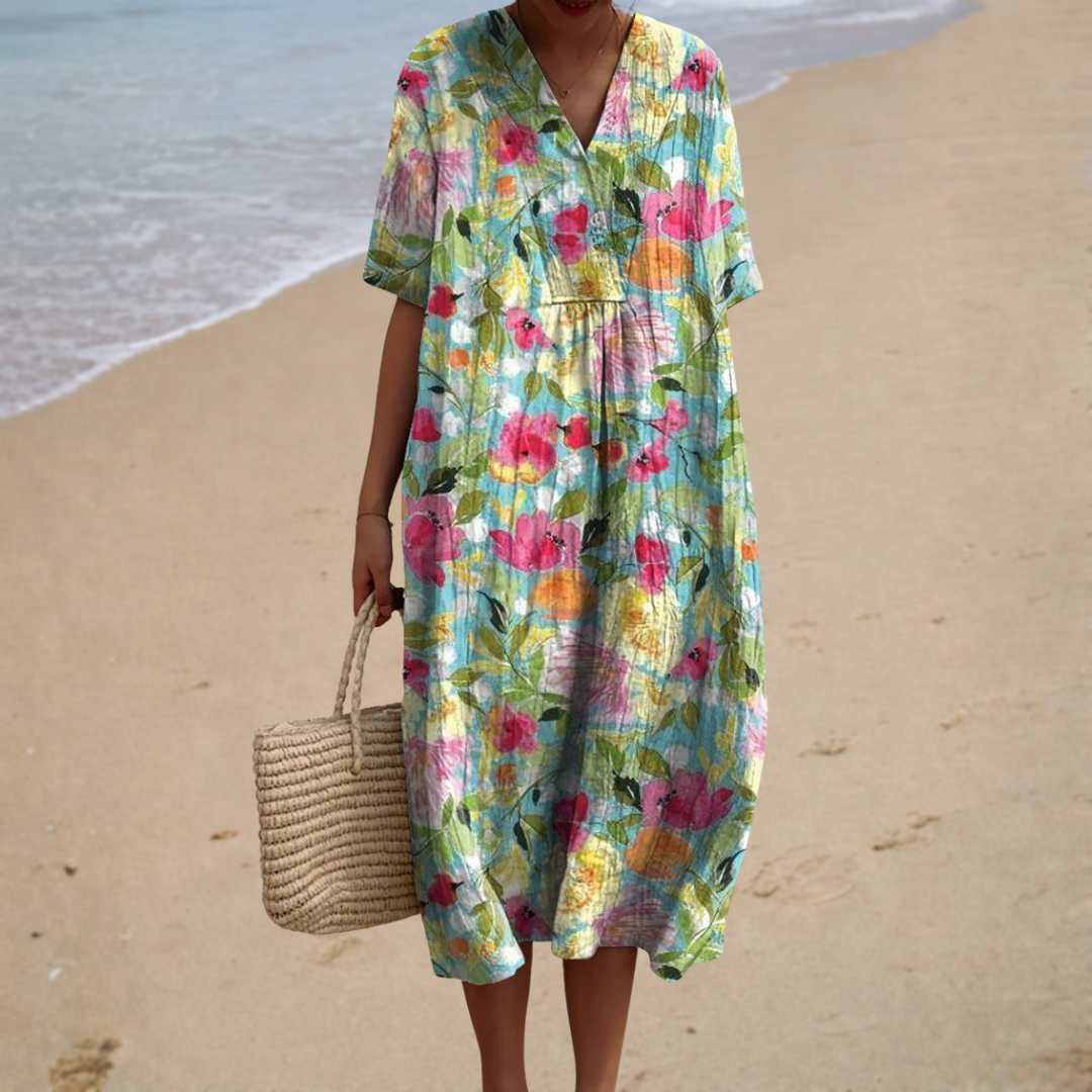 A woman wearing a relaxed printed summer dress, airy and stylish on a hot day.
