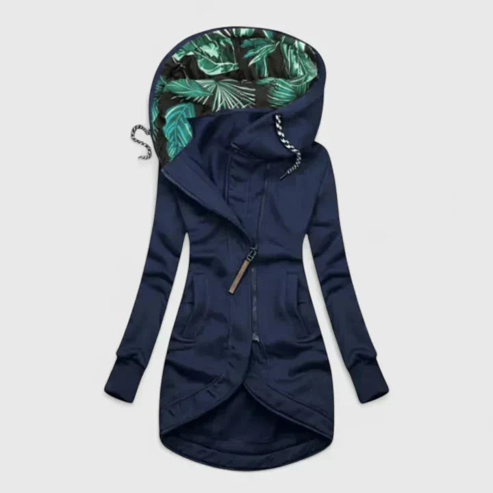 A navy hooded zip-up jacket with a leaf-print hood lining and a longer curved hem