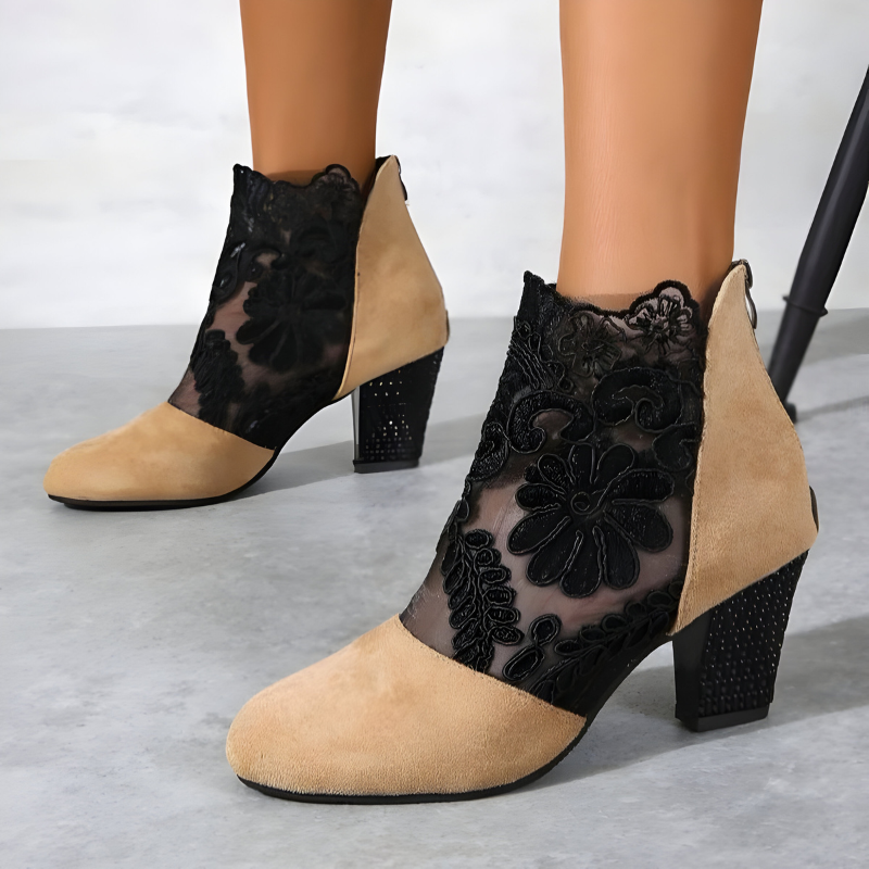 A woman in wide-fit comfort heels standing comfortably through a busy day out.