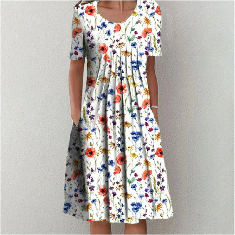 Woman wearing the floral midi dress with pockets, walking outdoors on a sunny day.