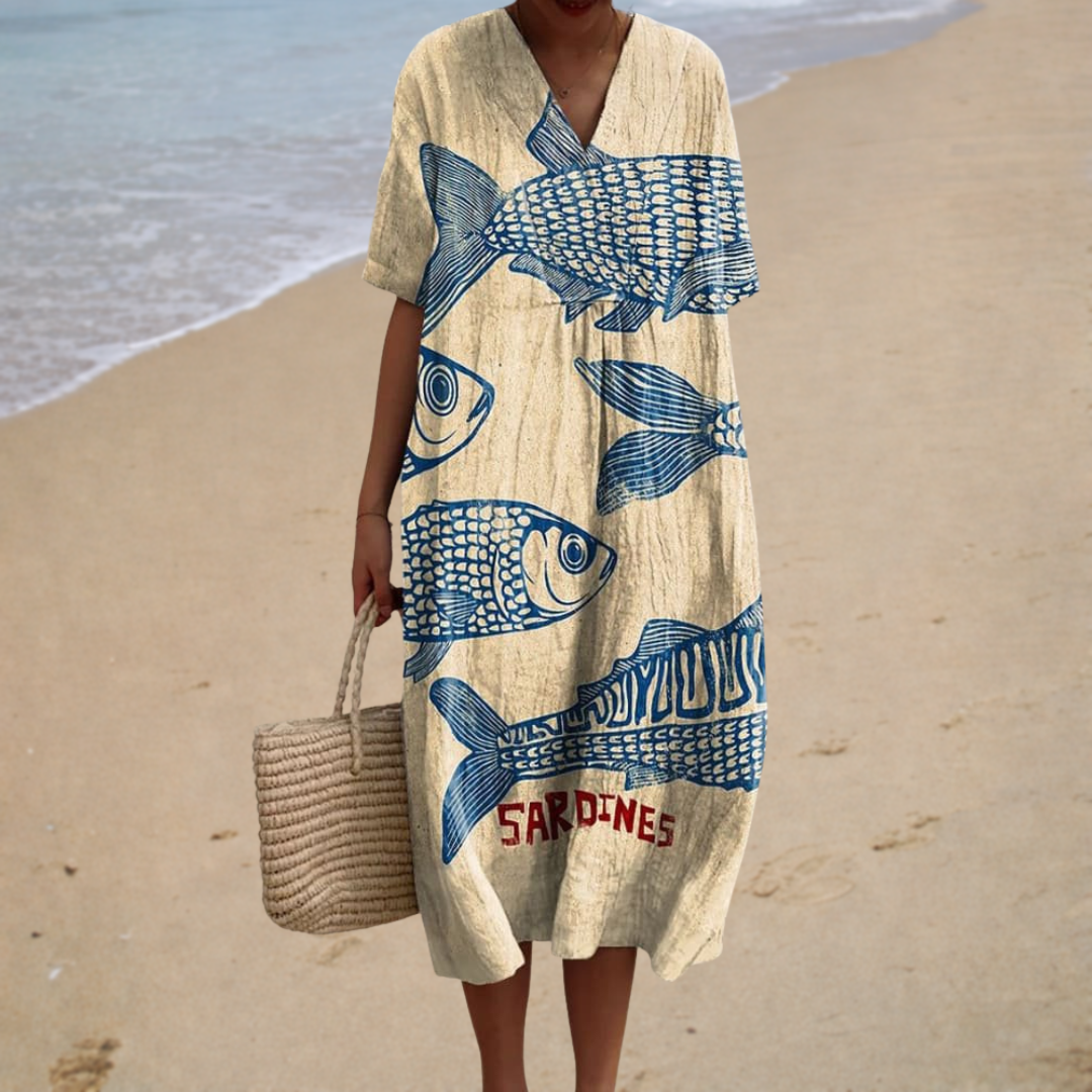 A woman wearing a comfortable flowing patterned summer dress, fresh and elegant on a hot day.