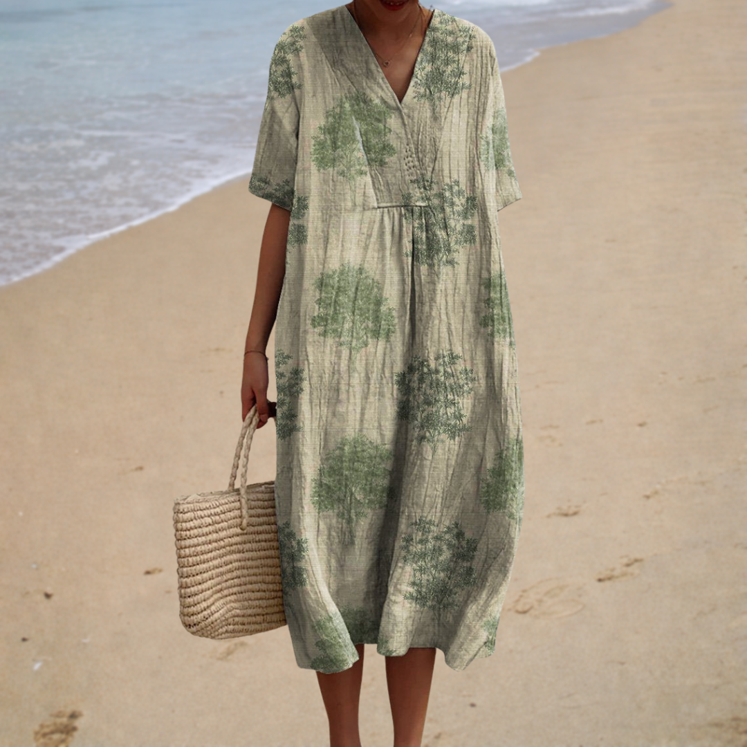 A woman wearing a relaxed printed summer dress on a warm evening stroll.