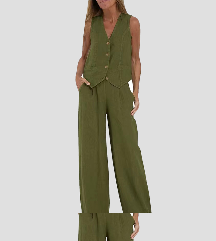 A woman wearing a tailored waistcoat with flowing wide-leg pants