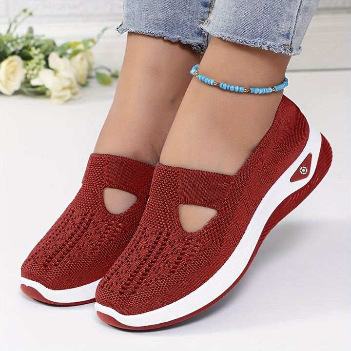 A woman stepping into easy slip-on comfort sneakers with no laces.