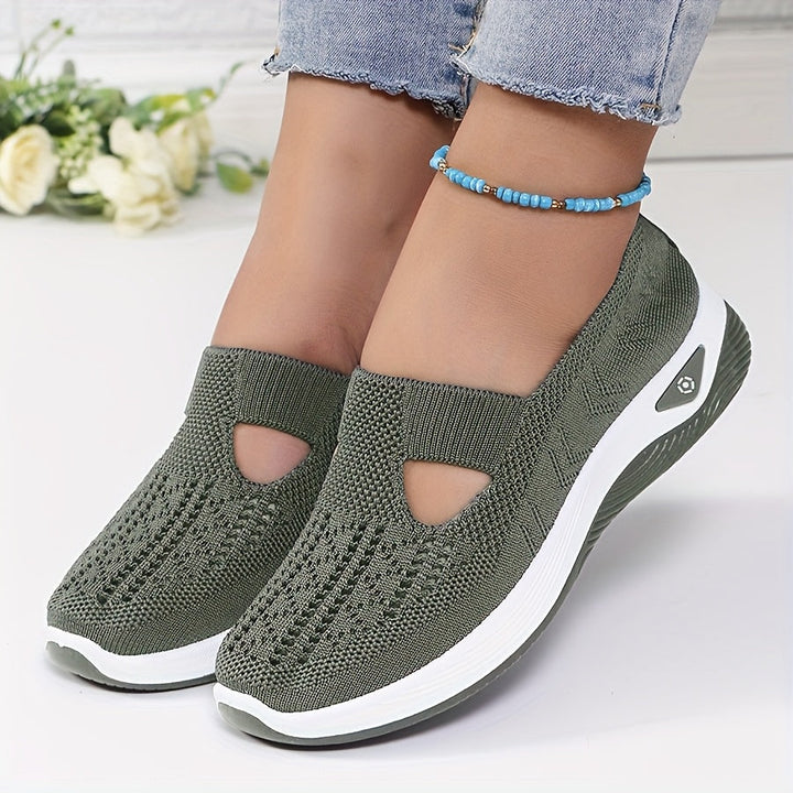 A woman stepping into easy slip-on comfort sneakers with no laces.
