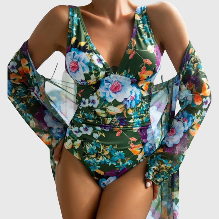A woman relaxing by the pool in an airy printed swimsuit, glowing and carefree in the summer sun.