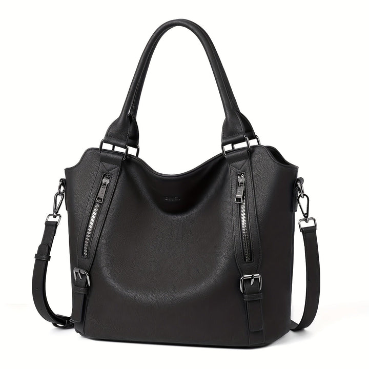 A woman wearing a roomy shoulder bag across her body while out running errands.