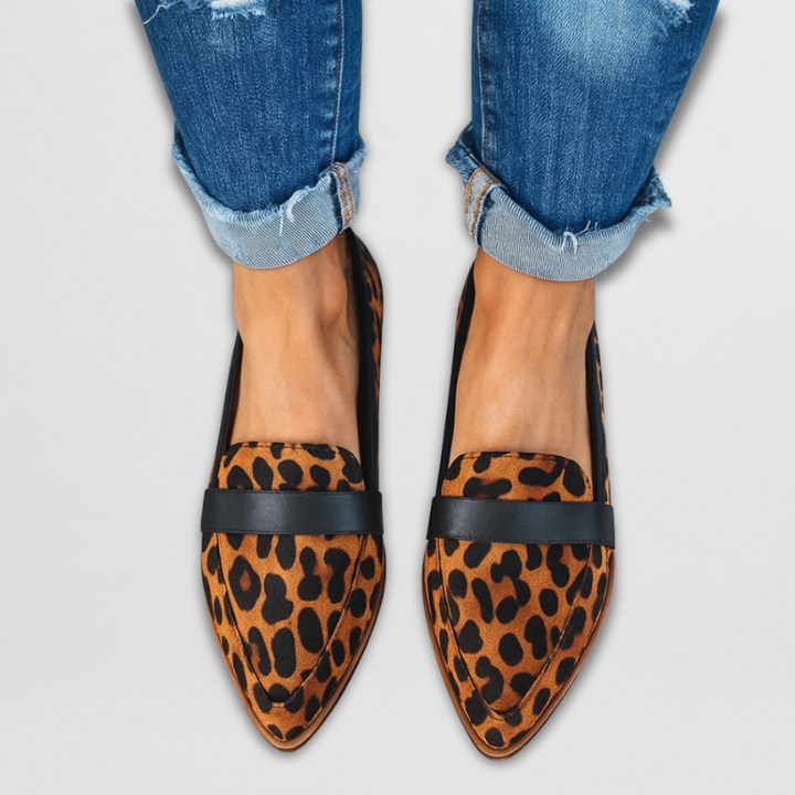 A woman wearing soft-touch loafers on a relaxed day out.
