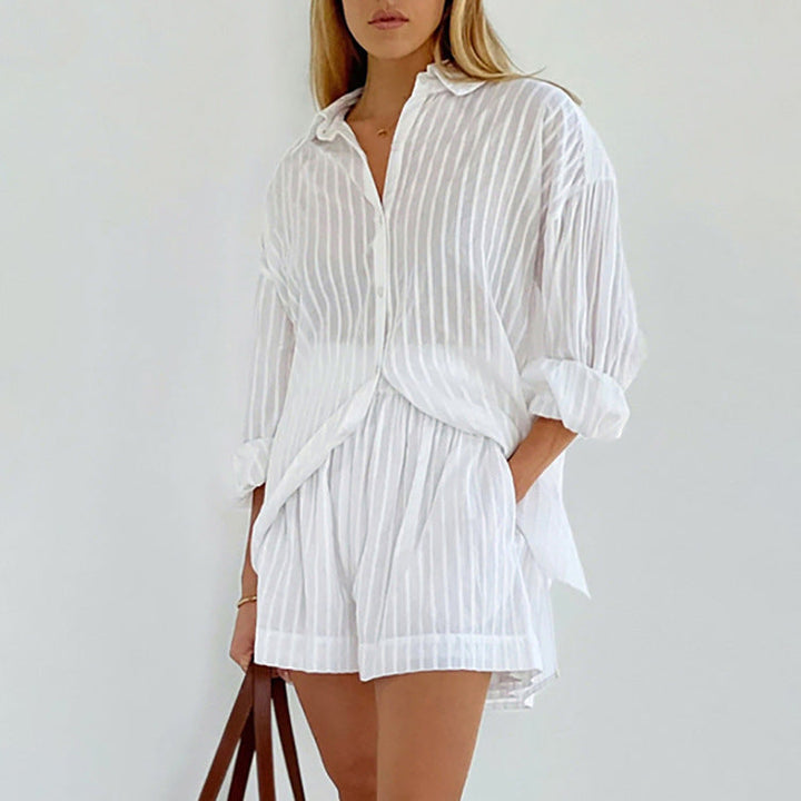 A woman wearing a button-front blouse with matching shorts