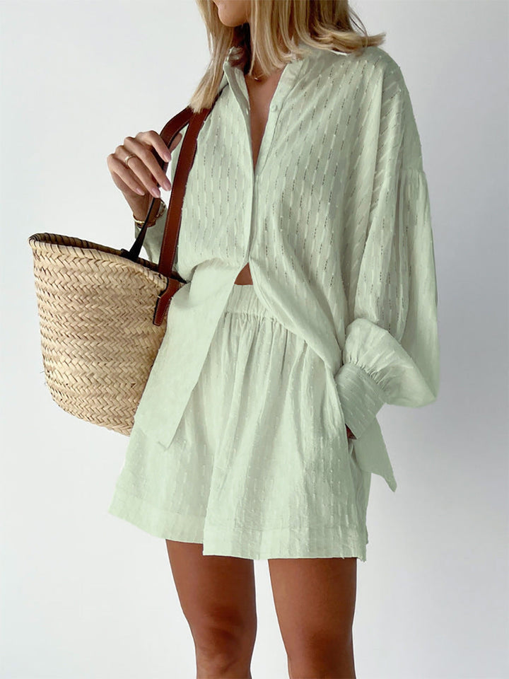 A woman wearing a classic button shirt with matching relaxed shorts, polished and easy.