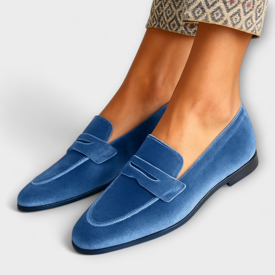 A woman wearing Soft-Touch loafers on an elegant day out.