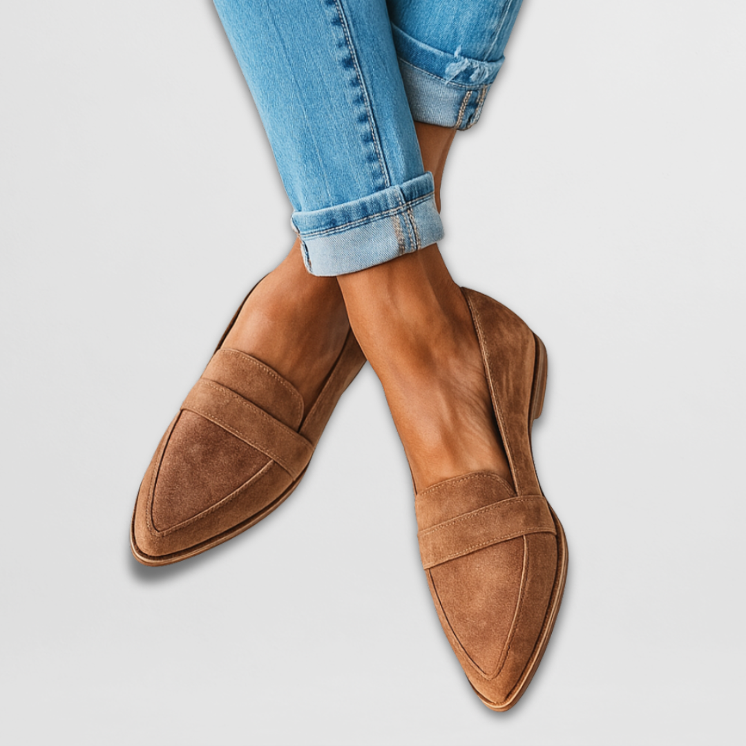A woman wearing soft-touch loafers on a relaxed day out.