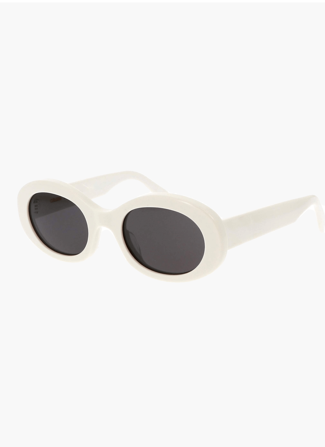 A woman wearing retro oval vintage sunglasses on a sunny day out.