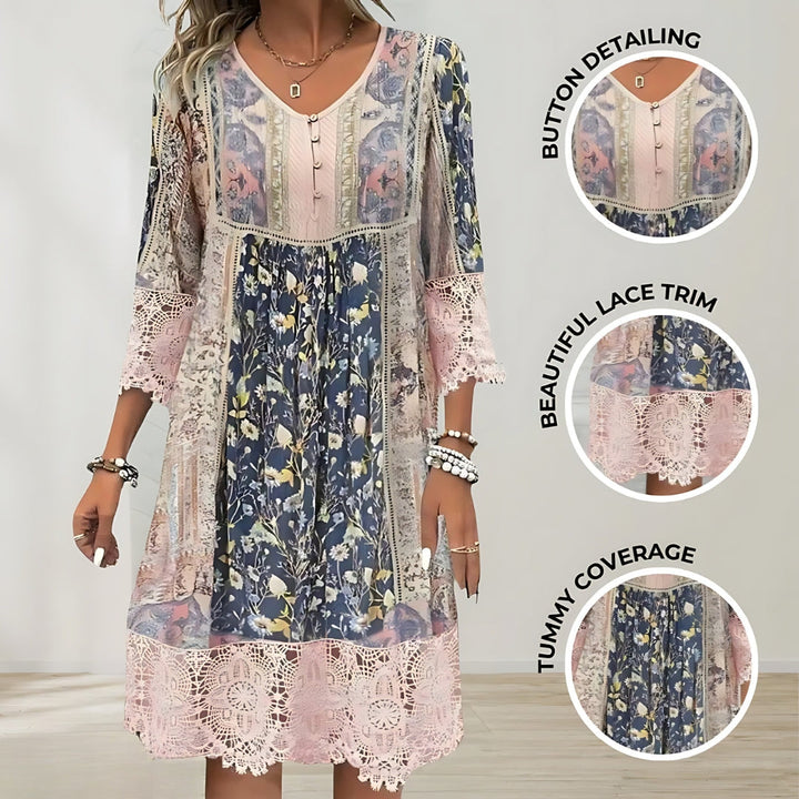 A woman wearing the Cindy romantic boho midi dress with scalloped trim and a floral patchwork print.
