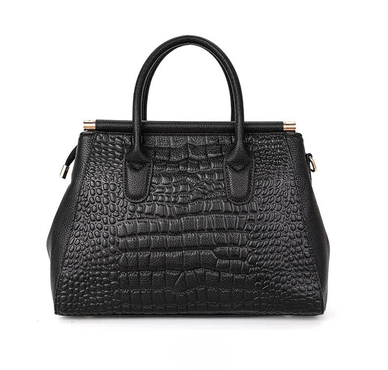 A woman carrying an elegant classic handbag on her arm as she heads out for the day.
