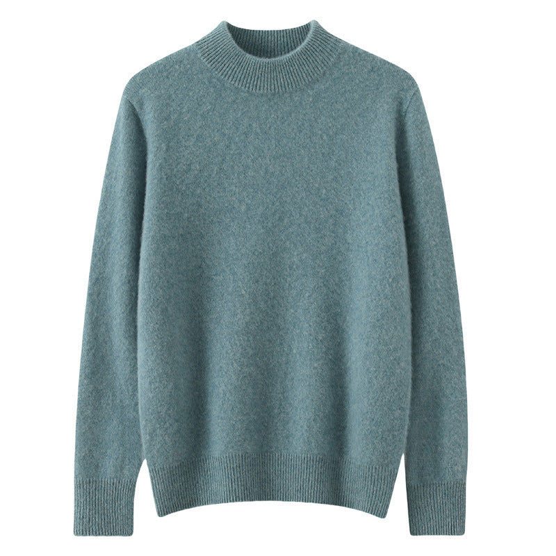 A woman wearing a soft luxe crew neck sweater with a matte finish, styled with smart pants.