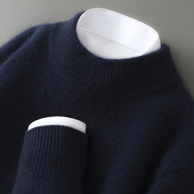 A woman wearing a soft luxe crew neck sweater with a matte finish, styled with smart pants.